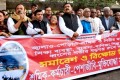 শুক্রবার জালাও পড়াও ও নিরীহ মানুষ হত্যার প্রতিবাদে জাতীয় প্রেসক্লাবের সামনে মানববন্ধন করে শ্রমিক-কর্মচারি-মুক্তিযোদ্ধা সমন্বয় পরিষদ-পিএনএস