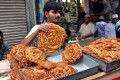 ঢাকার ঐতিহ্যবাহী চকবাজারের বাহারী ইফতারী কিনতে ক্রেতাদের ভিড়। ছবিটি তুলেছেন আমাদের চীপ ফটো সাংবাদিক আব্দুল হালিম-পিএনএস