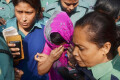 বৃহস্পতিবার দ্রুত বিচার ট্রাইব্যুনাল-৩ ঢাকা আদালতে ঐশী রহমানকে হাজির করে পরে আদালত ঐশী রহমানকে ফাঁসির রায় দেন –পিএনএস