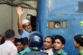 মীর কাশেম আলিকে রায় শেষে আদালত প্রাঙ্গন থেকে নিয়ে জাওয়া হচ্ছে-পিএনএস