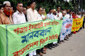 গাজায় ইসরায়েলি হামলার প্রতিবাদে মঙ্গলবার জাতীয় প্রেসক্লাবের সামনে মানববন্ধন করে বাংলাদেশ শিক্ষক সমিতি-পিএনএস