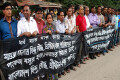 পংকজ বসুর হত্যাকান্ডের বিচারের দাবিতে শনিবার জাতীয় প্রেসক্লাবের সামনে মানববন্ধন করে বাংলাদেশ হিন্দু, বৌদ্ধ, খ্রীস্টান ঐক্য পরিষদ।- পিএনএস