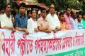 বিহারী পল্লীতে গণহত্যাকারীদের গ্রেফতার ও বিচারের দাবিতে রোববার জাতীয় প্রেসক্লাবের সামনে মানববন্ধন করে জাতীয়তাবাদী দেশ বাচাঁও মানুষ বাচাঁও আন্দোলন-পিএনএস